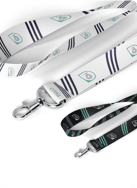 Close-up of two lanyards on a white background. One is white with blue stripes and logos, the other is black with green stripes and logos. Both have metal clips.
