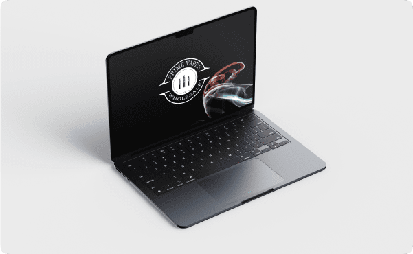 A sleek, open laptop with a black keyboard and screen displaying a logo with swirling smoke on a white background, creating a modern, tech-savvy feel.